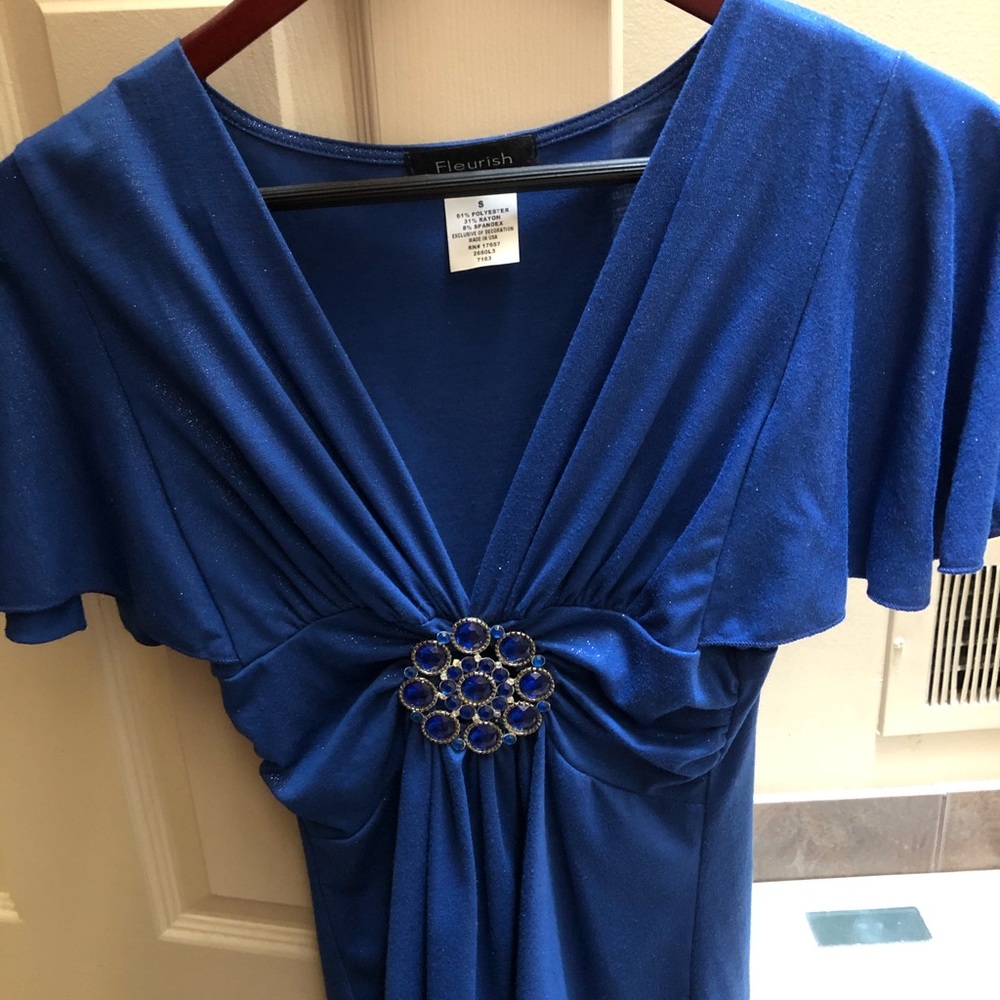 Blue Top with brooch